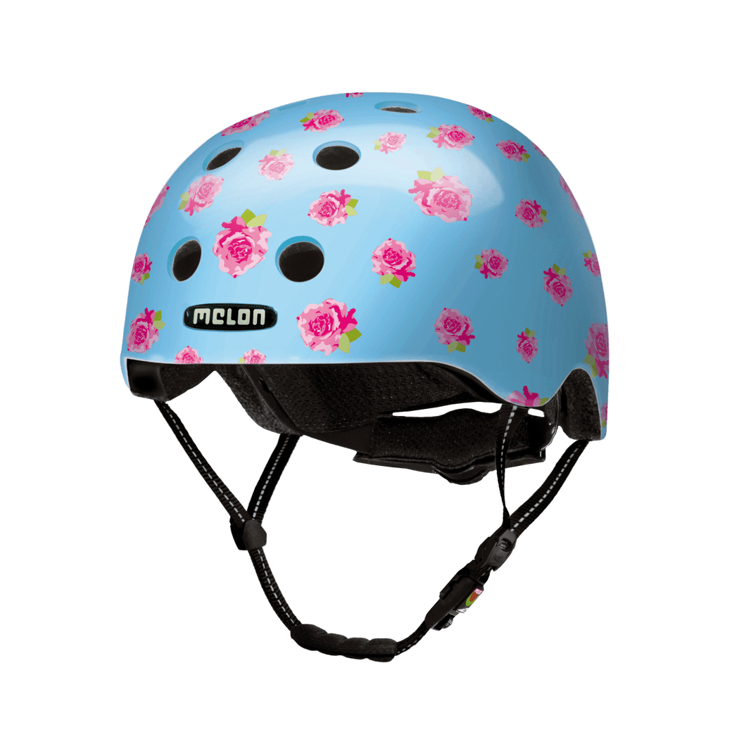 Melon Helmets rose printed blue helmet designed for skateboarding, biking, scooter, and commuting.