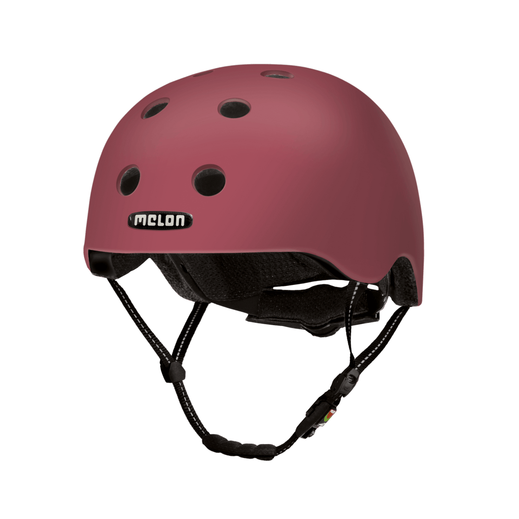 Melon Helmets matte finish red helmet designed for skateboarding, biking, scooter, and commuting.