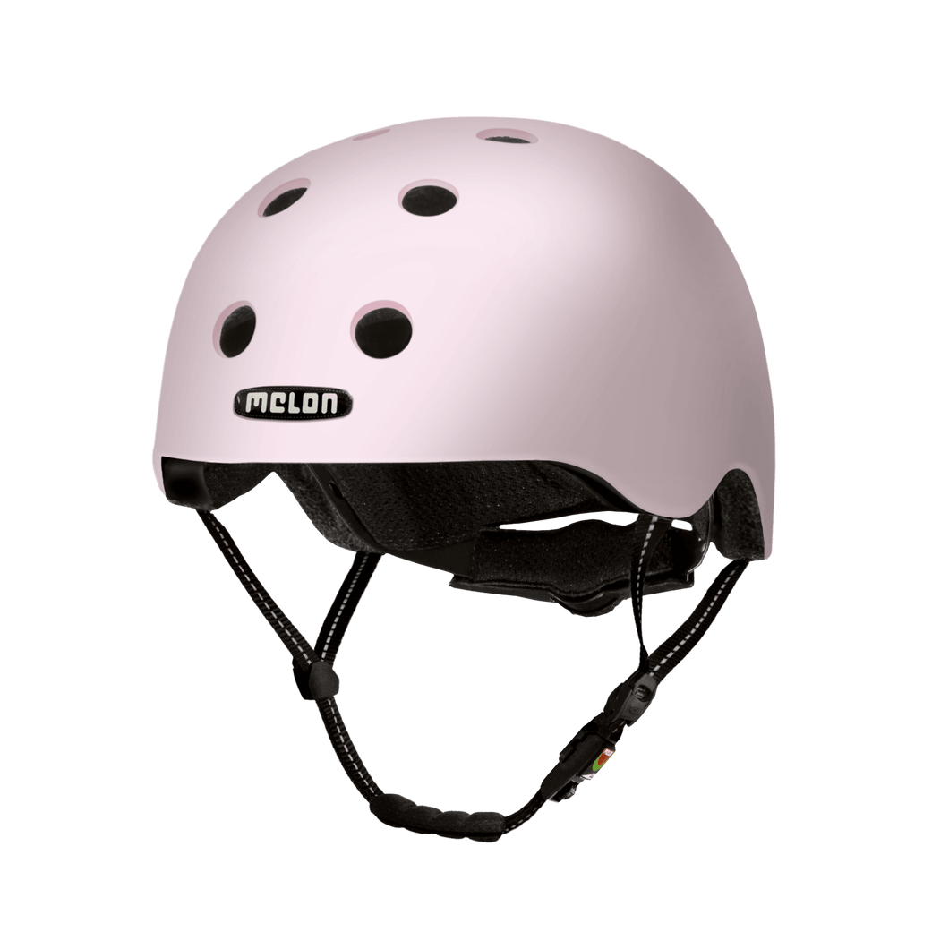 Melon Helmets matte finish pink helmet designed for skateboarding, biking, scooter, and commuting.